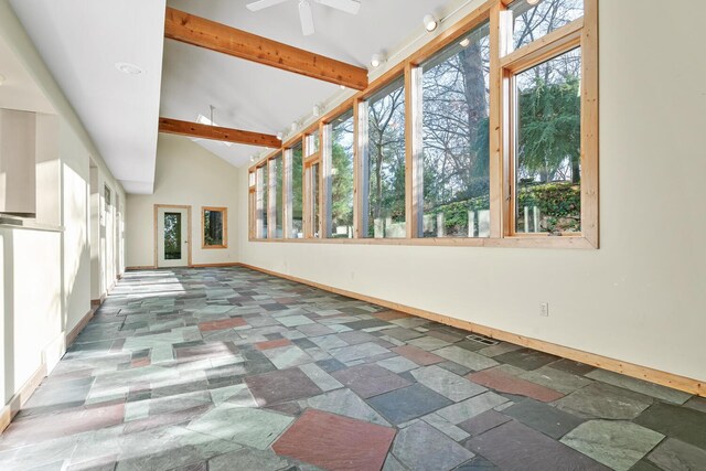 unfurnished sunroom featuring lofted ceiling with beams and ceiling fan