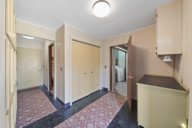 corridor with washer / clothes dryer