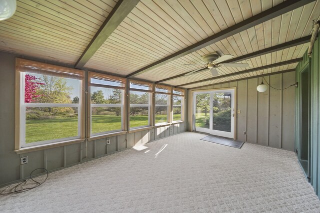 unfurnished sunroom with lofted ceiling and ceiling fan