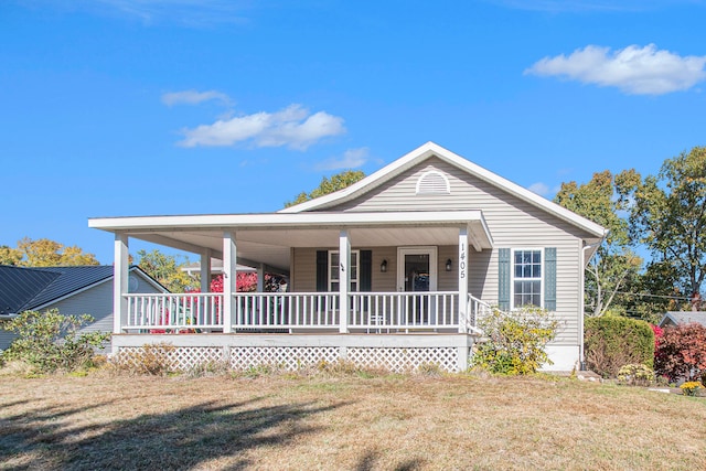 view of front facade with a porch and a front lawn