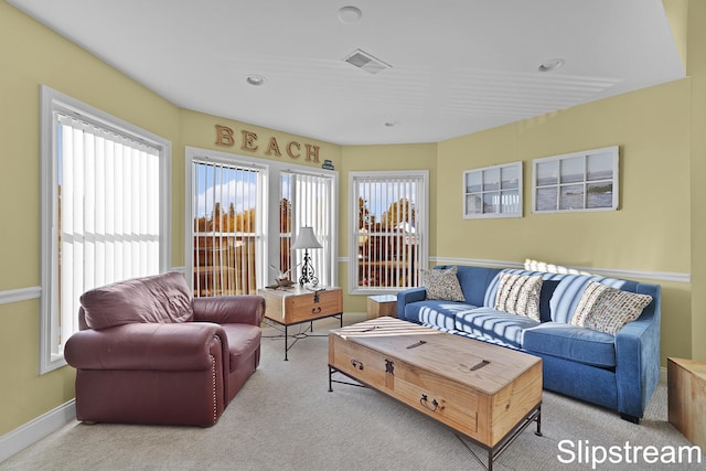 living room featuring light colored carpet