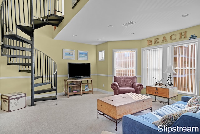 living room featuring light colored carpet