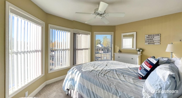 bedroom featuring ceiling fan, light colored carpet, and access to outside