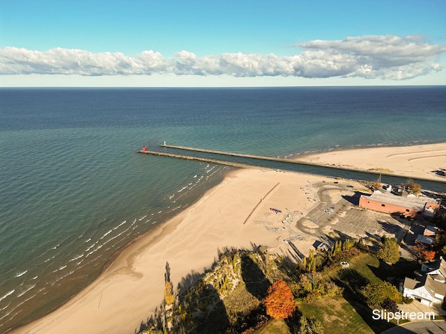 aerial view with a beach view and a water view