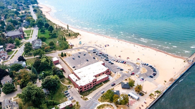 drone / aerial view with a view of the beach and a water view