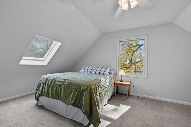 bedroom with carpet, vaulted ceiling, and ceiling fan