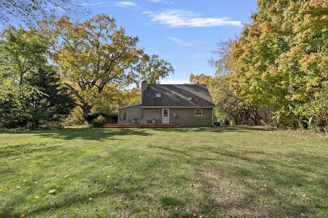 view of yard with a wooden deck