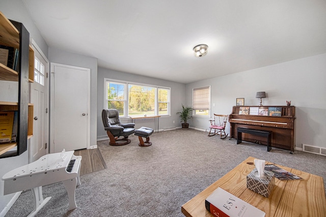 living area with carpet flooring