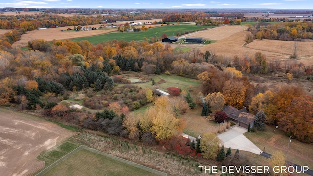 birds eye view of property featuring a rural view