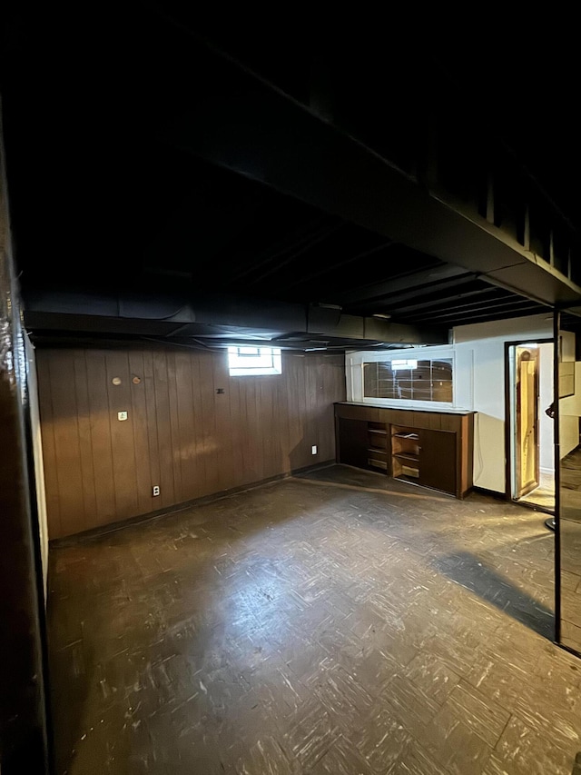 basement with wooden walls