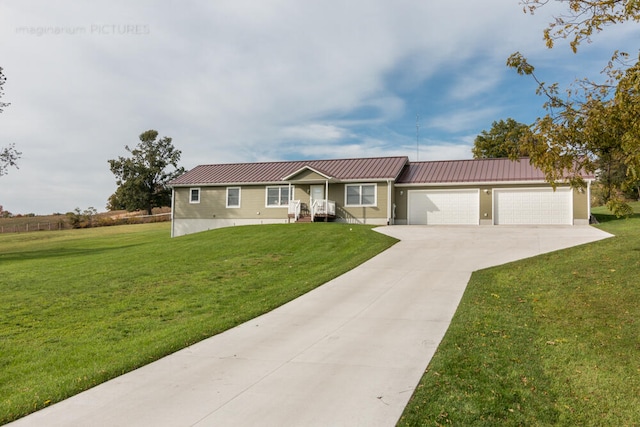 ranch-style house with a front lawn and a garage