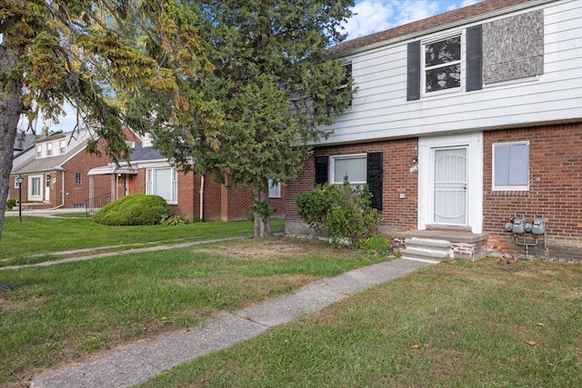 view of front of house with a front yard