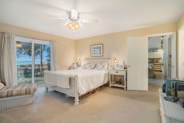 bedroom with carpet flooring, access to outside, and ceiling fan