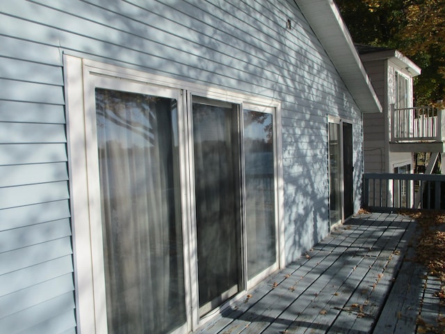 view of side of home featuring a deck