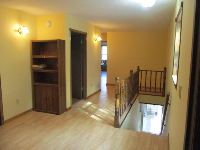 hall featuring light hardwood / wood-style floors