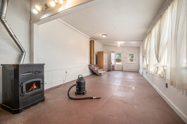 living room featuring concrete flooring