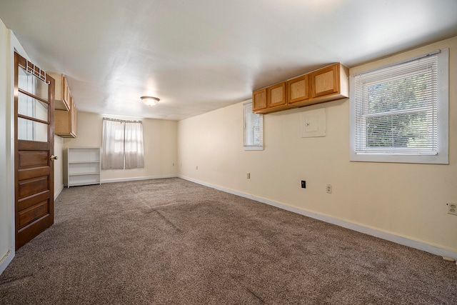 unfurnished living room with carpet floors