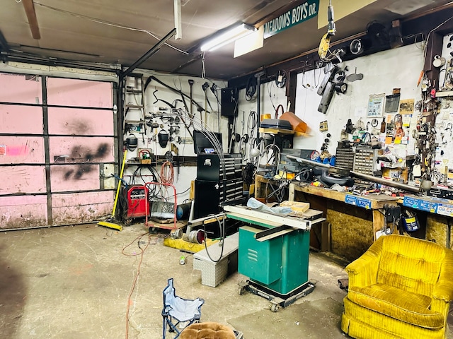 garage with a workshop area