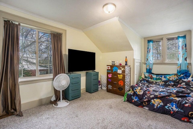 carpeted bedroom featuring multiple windows and vaulted ceiling