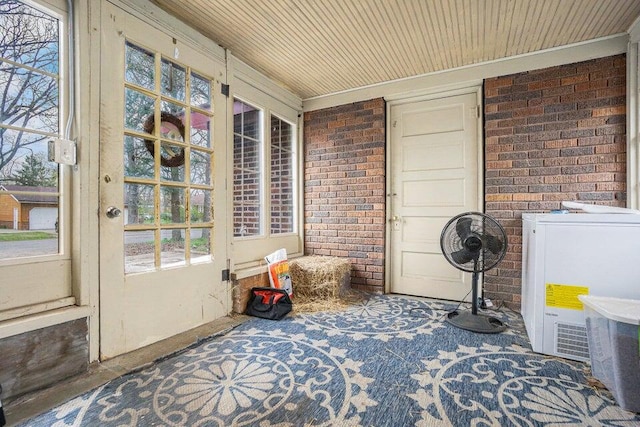 sunroom with wood ceiling