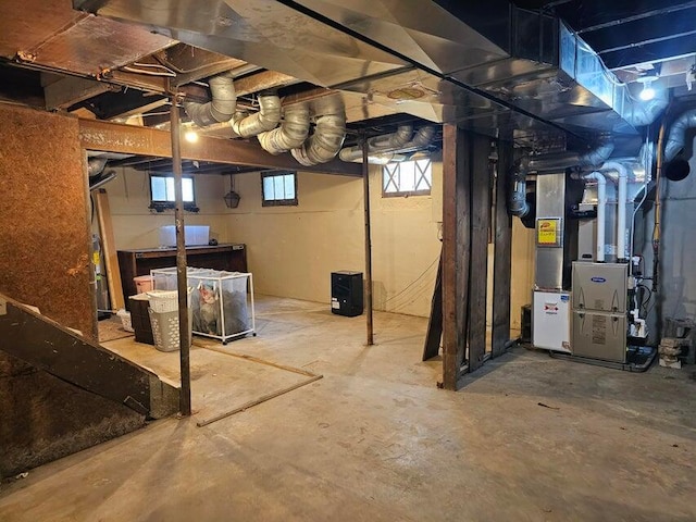 basement featuring heating unit