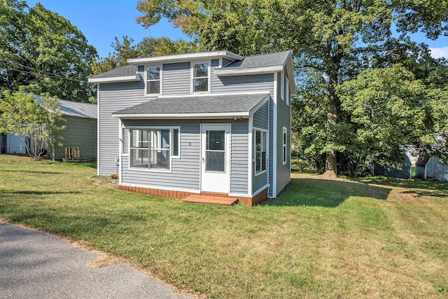 view of front of home with a front lawn