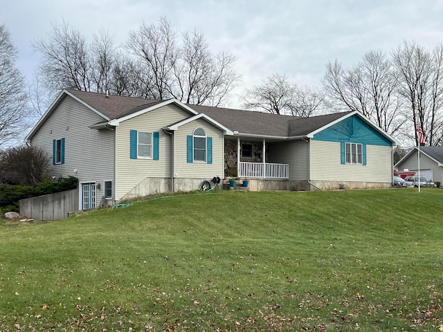 view of front of house with a porch and a front yard