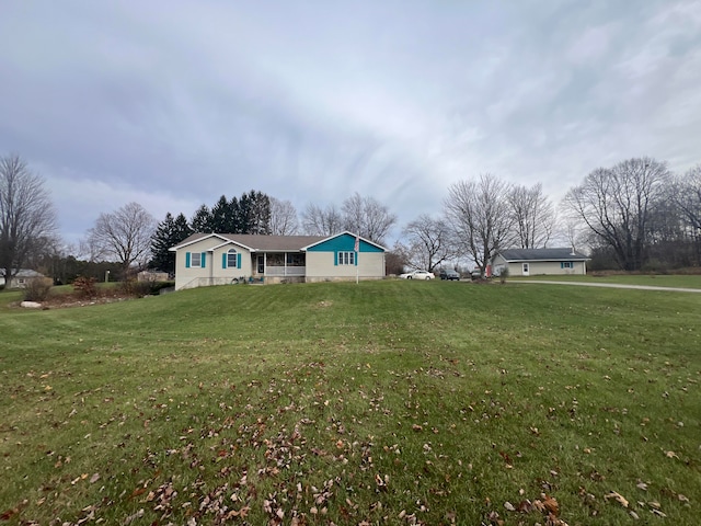 exterior space with a front lawn