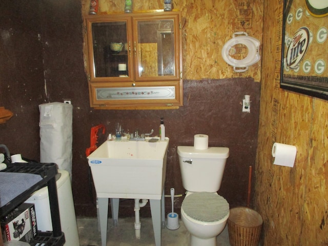 bathroom with toilet and sink