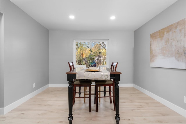 dining room featuring light hardwood / wood-style floors