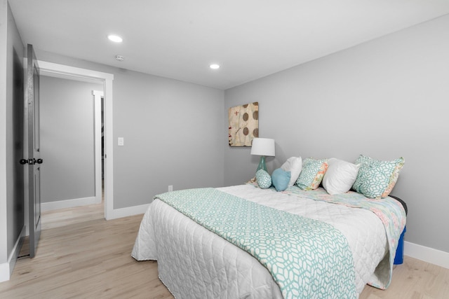 bedroom featuring light wood-type flooring