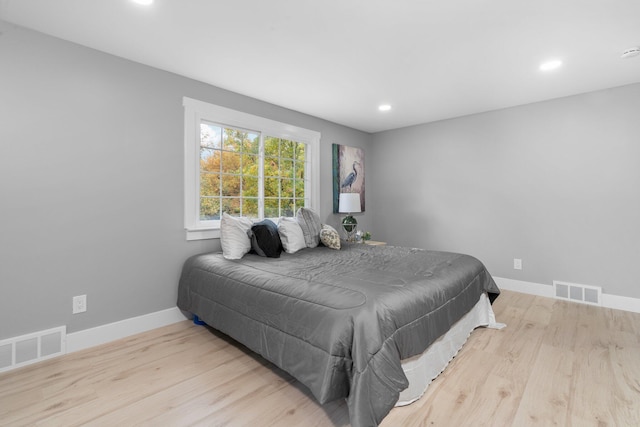 bedroom featuring light hardwood / wood-style floors