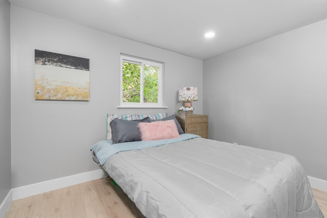 bedroom featuring hardwood / wood-style flooring