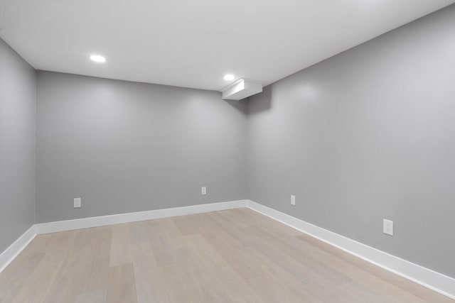 empty room with light hardwood / wood-style floors