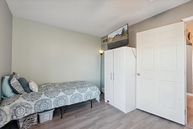 bedroom featuring light hardwood / wood-style flooring