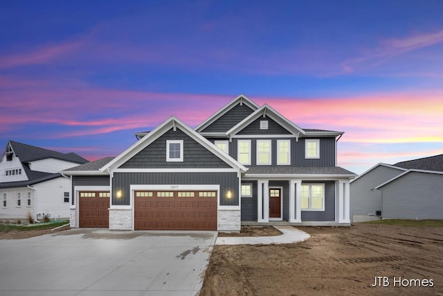 craftsman-style house featuring a garage