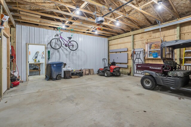 garage featuring a garage door opener