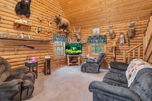 living room featuring rustic walls, carpet floors, high vaulted ceiling, and plenty of natural light