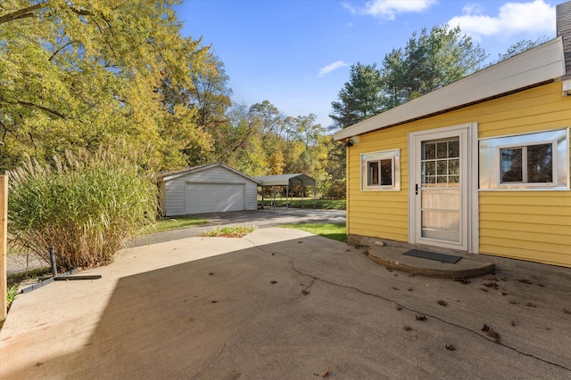 exterior space with an outdoor structure and a garage