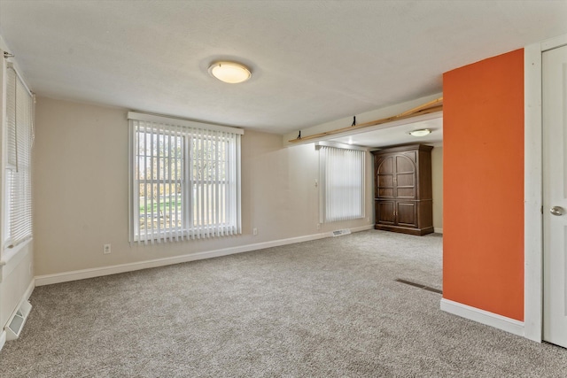 empty room with carpet floors