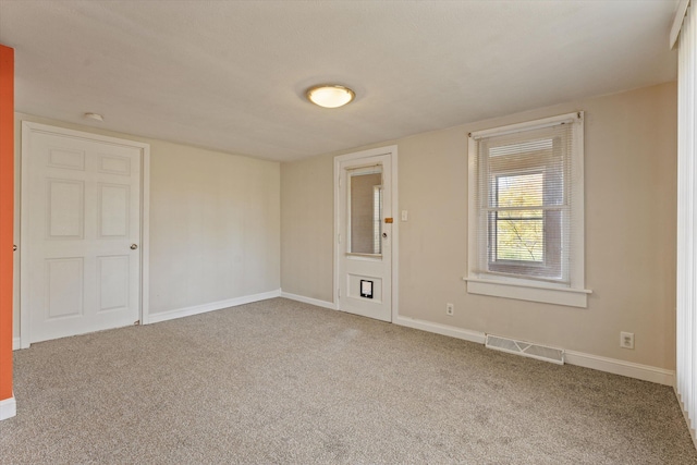 empty room with carpet floors