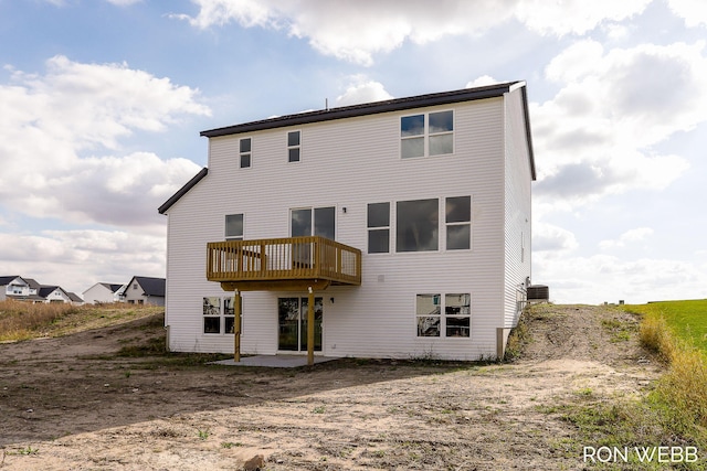 rear view of property featuring a patio