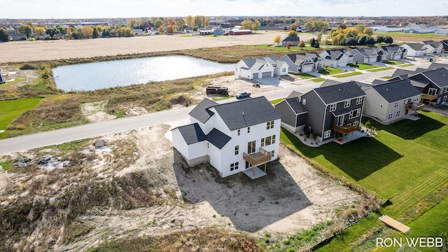 bird's eye view with a water view