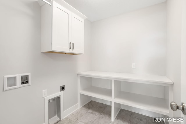 laundry area with hookup for a washing machine, electric dryer hookup, and cabinets