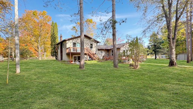 view of yard featuring a wooden deck