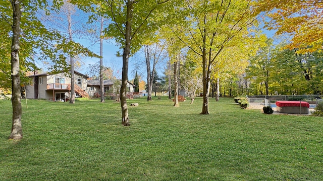 view of yard with a wooden deck