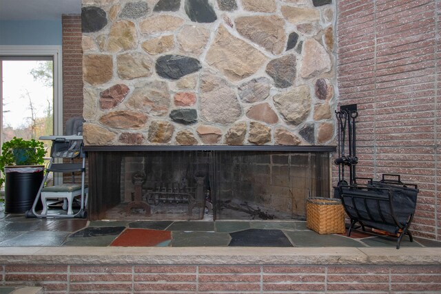 details featuring a stone fireplace