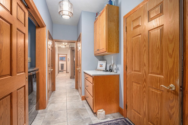 interior space with light tile patterned floors