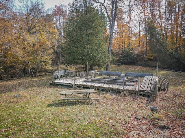 view of yard with a wooden deck