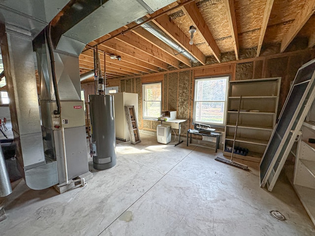 basement with heating unit and water heater